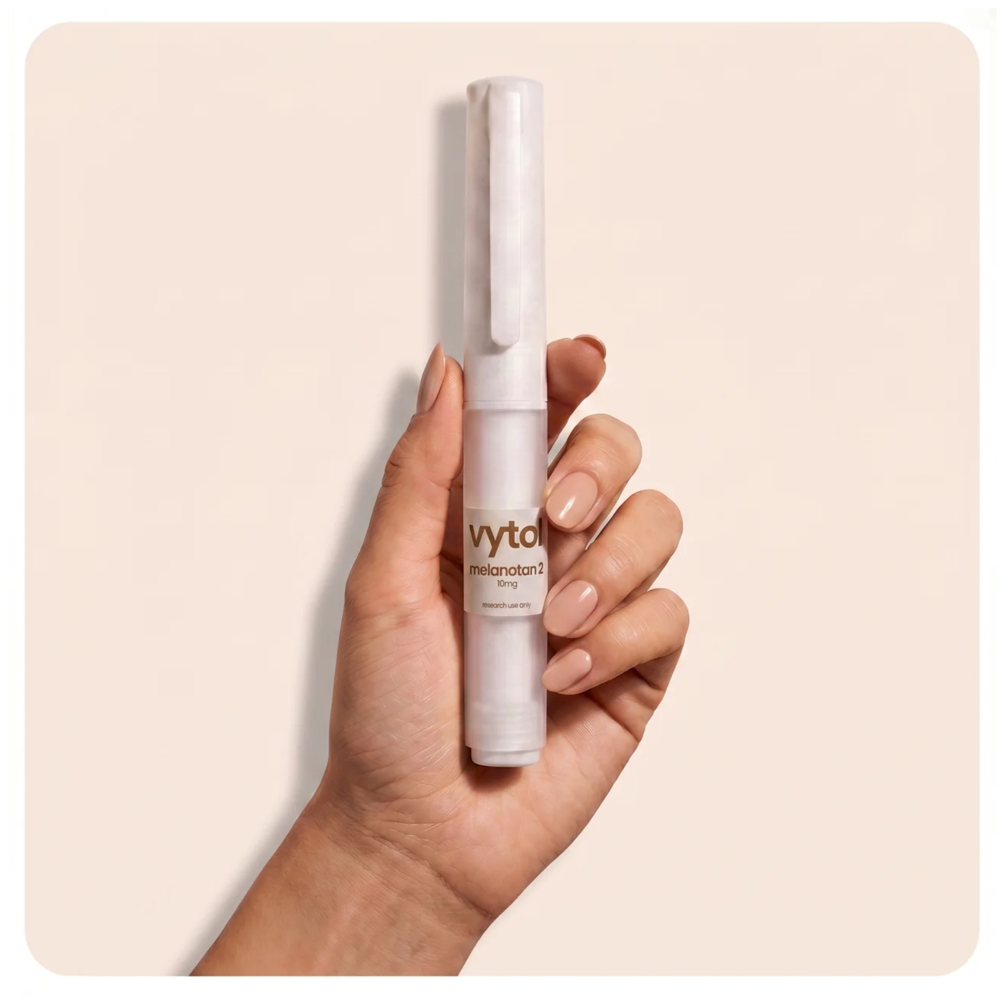 Vytol Melanotan 2 10mg pre-filled research pen, white injection pen with Vytol branded label, research use only, cream background